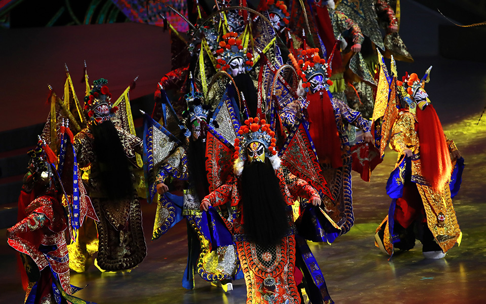 Performers take part in the FIBA Basketball World Cup 2019 opening ceremony at the Beijing National Aquatics Center or Water Cube in Beijing, China, Friday, Aug. 30 2019. (How Hwee Young/Pool Photo via AP)