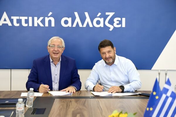 Ο Νίκος Χαρδαλιάς και συνεργάτης του υπογράφουν συμφωνία για ασφαλείς γειτονιές και σύγχρονες υποδομές.